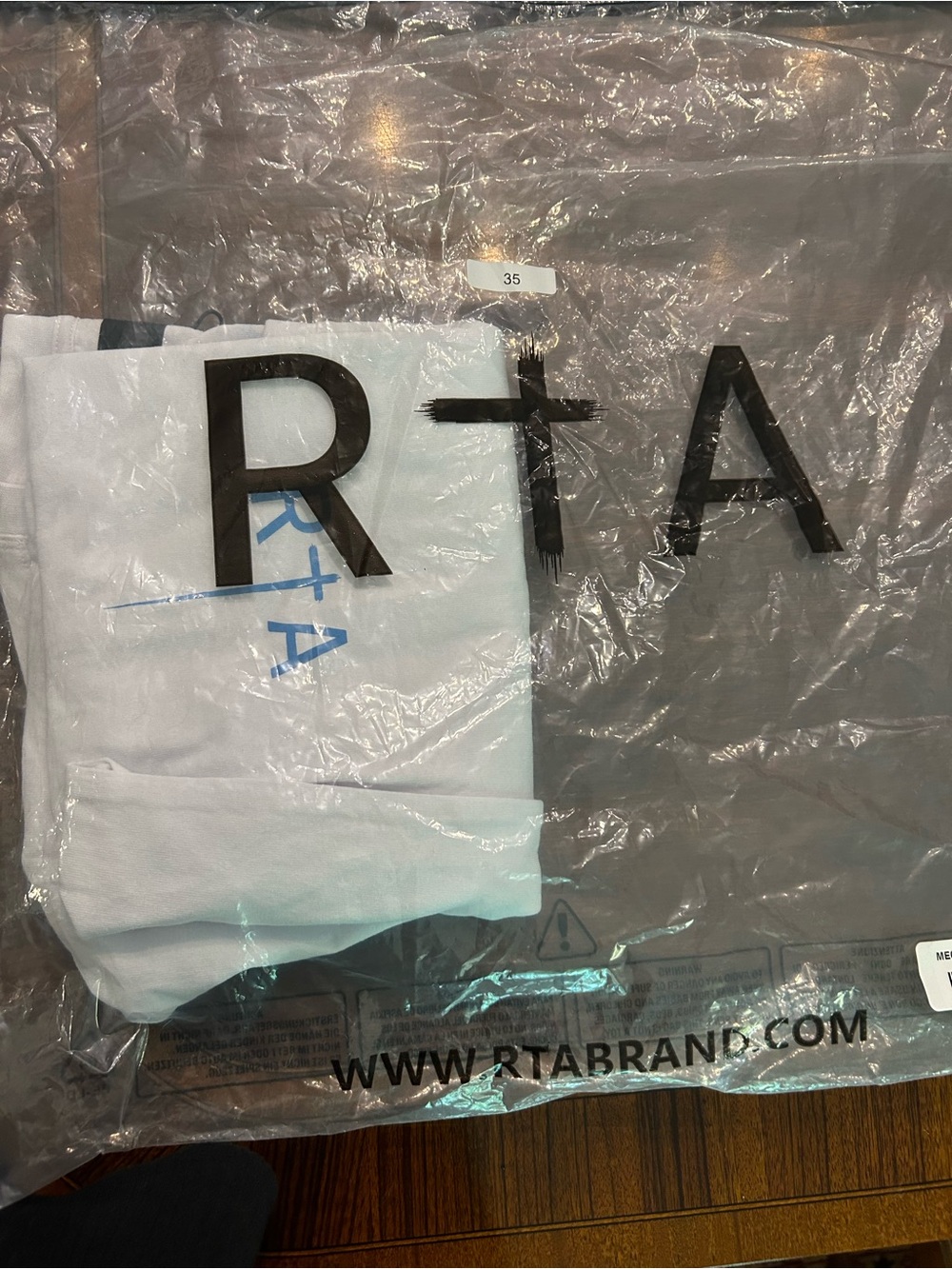 RtA White Tee with Blue Logo Accent